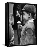 Boy Eating Ice Cream Cone at the Circus in Madison Square Garden-Cornell Capa-Framed Stretched Canvas