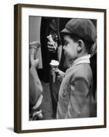 Boy Eating Ice Cream Cone at the Circus in Madison Square Garden-Cornell Capa-Framed Photographic Print