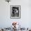 Boy Eating Ice Cream Cone at the Circus in Madison Square Garden-Cornell Capa-Framed Photographic Print displayed on a wall