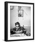 Boy Eating Spaghetti under Picture of His Brother Who Died During Invasion of Sicily-null-Framed Photographic Print