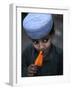 Boy Eats an Ice Lolly in a Neighborhood on the Outskirts of Islamabad, Pakistan-null-Framed Photographic Print