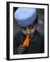 Boy Eats an Ice Lolly in a Neighborhood on the Outskirts of Islamabad, Pakistan-null-Framed Photographic Print