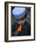 Boy Eats an Ice Lolly in a Neighborhood on the Outskirts of Islamabad, Pakistan-null-Framed Photographic Print