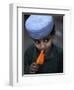 Boy Eats an Ice Lolly in a Neighborhood on the Outskirts of Islamabad, Pakistan-null-Framed Photographic Print