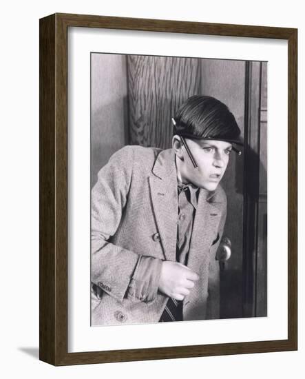 Boy Eavesdropping at Door-null-Framed Photo