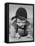 Boy Engrossed in Playing Migs-null-Framed Stretched Canvas