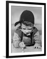 Boy Engrossed in Playing Migs-null-Framed Photographic Print