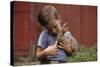 Boy Feeding a Rabbit-William P. Gottlieb-Stretched Canvas