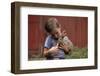 Boy Feeding a Rabbit-William P. Gottlieb-Framed Photographic Print