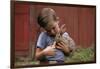 Boy Feeding a Rabbit-William P. Gottlieb-Framed Photographic Print