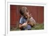 Boy Feeding a Rabbit-William P. Gottlieb-Framed Photographic Print