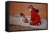 Boy Feeding Dog on Sidewalk-William P. Gottlieb-Framed Stretched Canvas