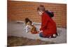 Boy Feeding Dog on Sidewalk-William P. Gottlieb-Mounted Photographic Print