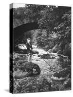 Boy Fishing by the Bridge over the Laroch in Ballachulish-Hans Wild-Stretched Canvas