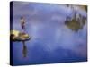 Boy Fishing from a Rock on a Pond-null-Stretched Canvas