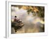 Boy Fishing from a Rock on a Pond-null-Framed Photographic Print