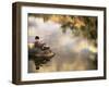 Boy Fishing from a Rock on a Pond-null-Framed Photographic Print