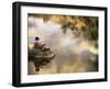 Boy Fishing from a Rock on a Pond-null-Framed Photographic Print