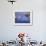 Boy Fishing from a Rock on a Pond-null-Framed Photographic Print displayed on a wall