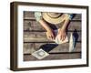 Boy Hands Making a Paper Boats on the Pier Top View-Soloviova Liudmyla-Framed Photographic Print