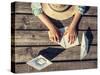 Boy Hands Making a Paper Boats on the Pier Top View-Soloviova Liudmyla-Stretched Canvas