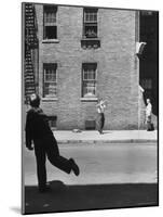 Boy Hitting Ball During Game of Stickball-Ralph Morse-Mounted Photographic Print