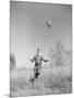 Boy Holding a Balloon-Philip Gendreau-Mounted Photographic Print