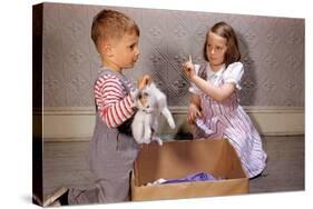 Boy Holding Kitten-William P. Gottlieb-Stretched Canvas