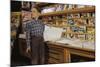 Boy Holding Paper in Newsstand-William P. Gottlieb-Mounted Photographic Print