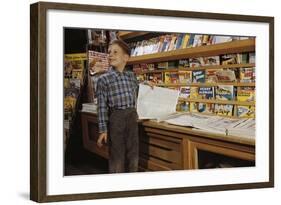 Boy Holding Paper in Newsstand-William P. Gottlieb-Framed Photographic Print