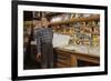 Boy Holding Paper in Newsstand-William P. Gottlieb-Framed Photographic Print