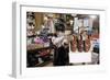 Boy Holding Shotgun in Sporting Goods Store-William P. Gottlieb-Framed Photographic Print