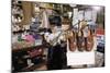 Boy Holding Shotgun in Sporting Goods Store-William P. Gottlieb-Mounted Photographic Print