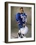 Boy in an Oversized Football Uniform Holding a Helmet-null-Framed Photographic Print