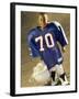 Boy in an Oversized Football Uniform Holding a Helmet-null-Framed Photographic Print