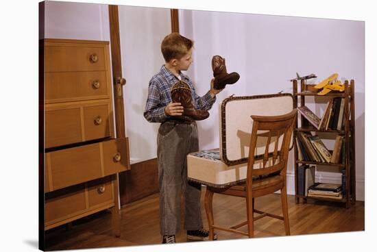 Boy Looking at Cowboy Boots-William P. Gottlieb-Stretched Canvas