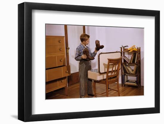 Boy Looking at Cowboy Boots-William P. Gottlieb-Framed Photographic Print