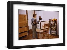 Boy Looking at Cowboy Boots-William P. Gottlieb-Framed Photographic Print