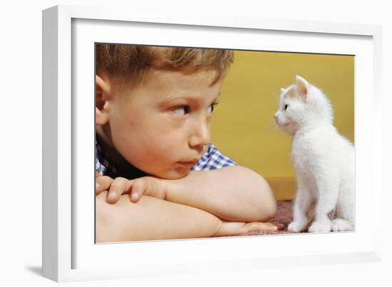 Boy Looking at White Kitten-William P^ Gottlieb-Framed Photographic Print