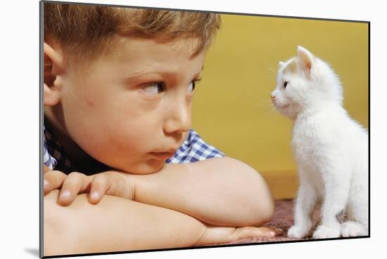 Boy Looking at White Kitten-William P^ Gottlieb-Mounted Photographic Print