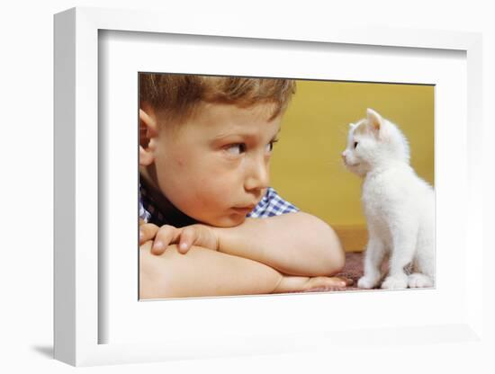 Boy Looking at White Kitten-William P. Gottlieb-Framed Photographic Print