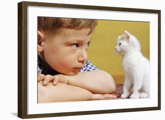 Boy Looking at White Kitten-William P. Gottlieb-Framed Photographic Print