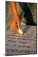 Boy placing stone on a grave in the Mount of Olives Jewish cemetery, Jerusalem-Godong-Mounted Photographic Print