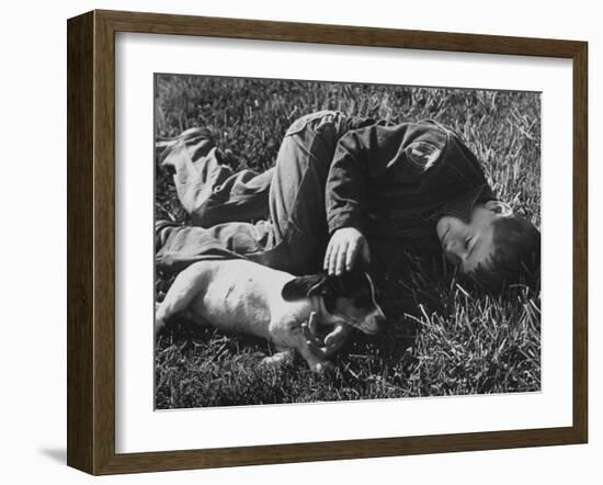 Boy Playing with His Pet Dog-Ed Clark-Framed Photographic Print