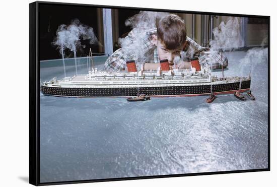 Boy Playing with Toy Ocean Liner-William P. Gottlieb-Framed Stretched Canvas