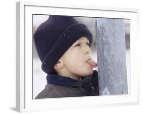 Boy Putting Tongue to Frozen Pole-Dann Tardif-Framed Photographic Print