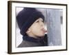 Boy Putting Tongue to Frozen Pole-Dann Tardif-Framed Photographic Print