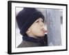 Boy Putting Tongue to Frozen Pole-Dann Tardif-Framed Photographic Print