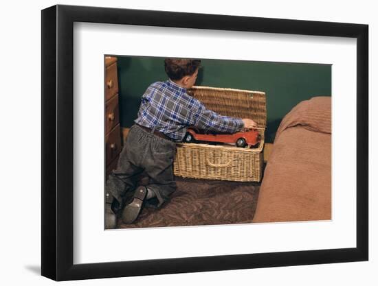 Boy Removing Fire Engine from Toy Chest-William P. Gottlieb-Framed Photographic Print