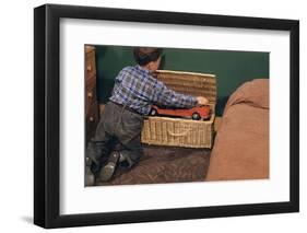 Boy Removing Fire Engine from Toy Chest-William P. Gottlieb-Framed Photographic Print